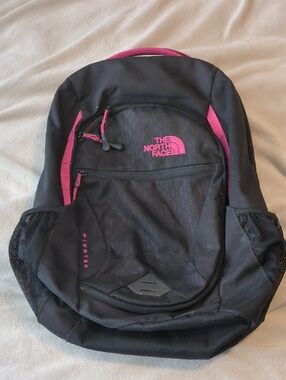 The North Face Black and Pink "Pivoter" Backpack